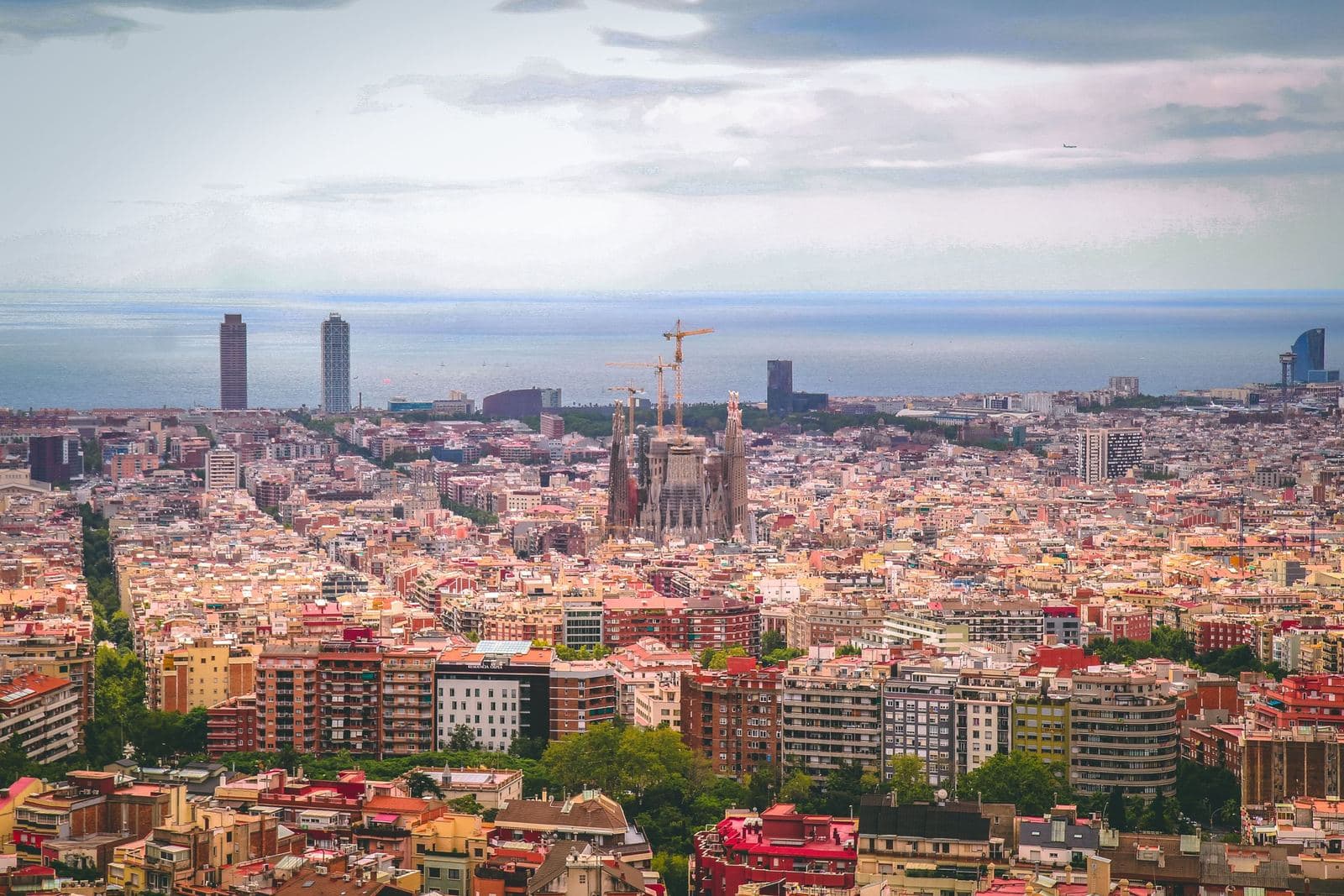 Barcelona from above, with the Sagrada Família and the sea