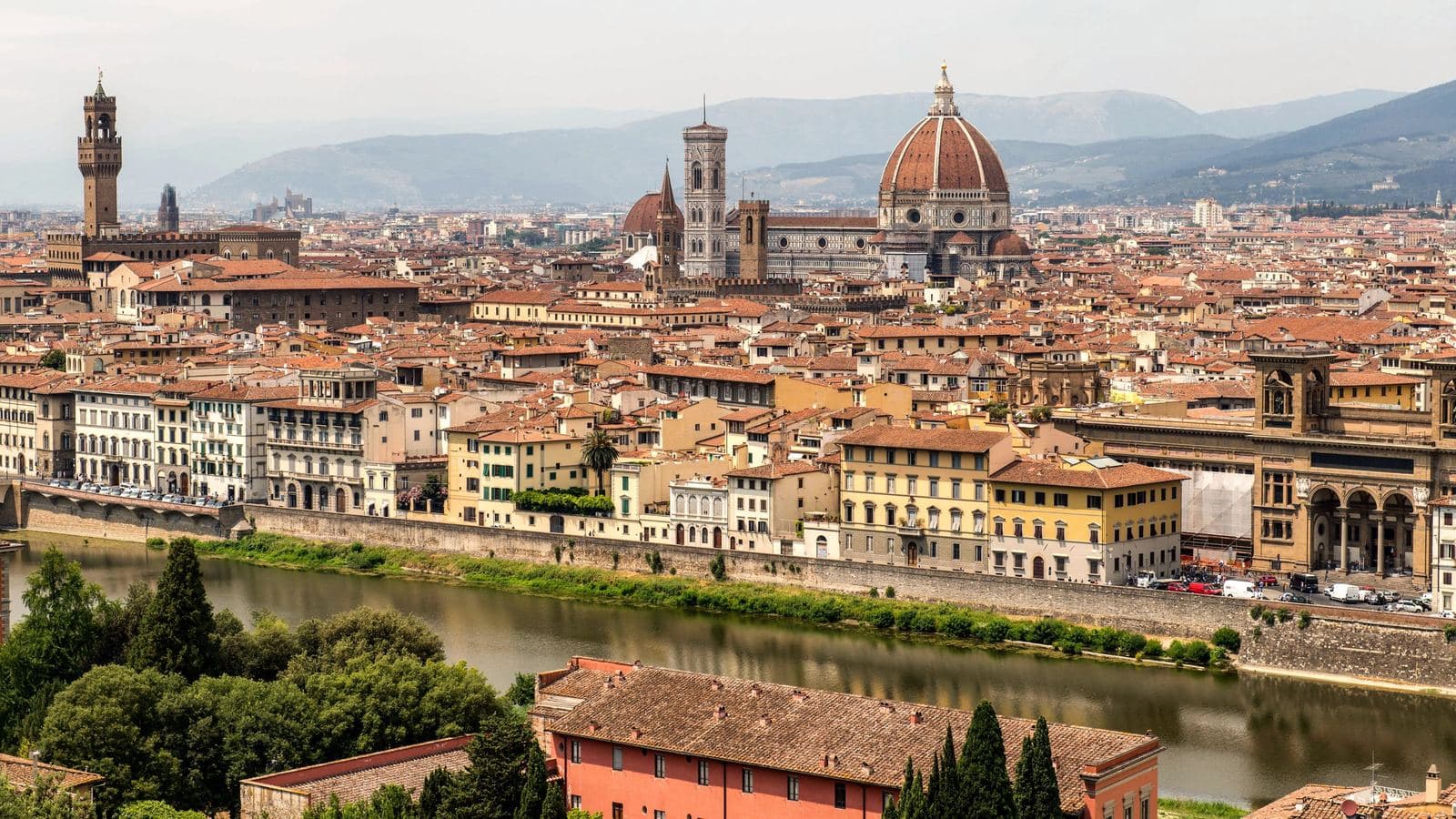 Florence and its cathedral dome above the Arno