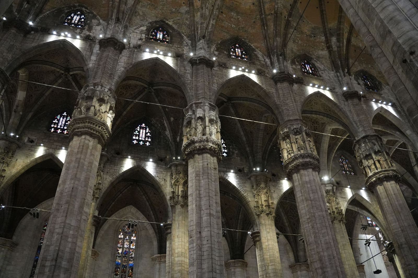 Gothic columns and arches inside Milan Cathedral