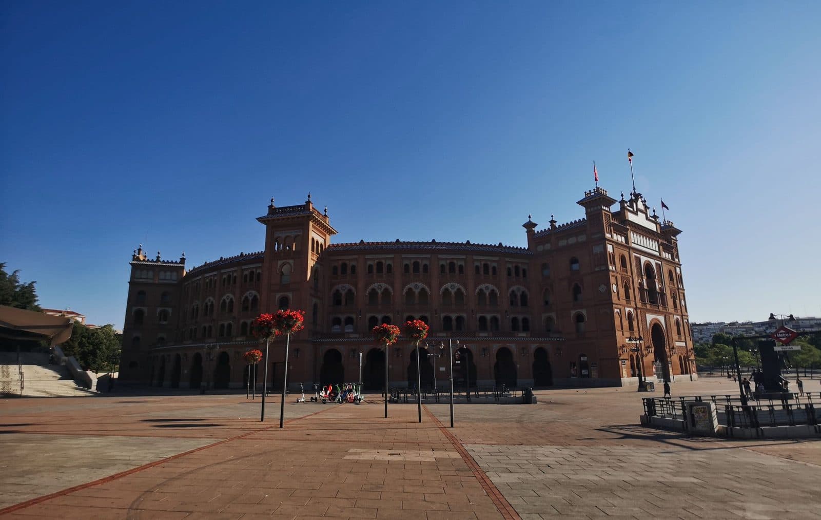 Las Ventas bullring across its wide forecourt on a sunny day