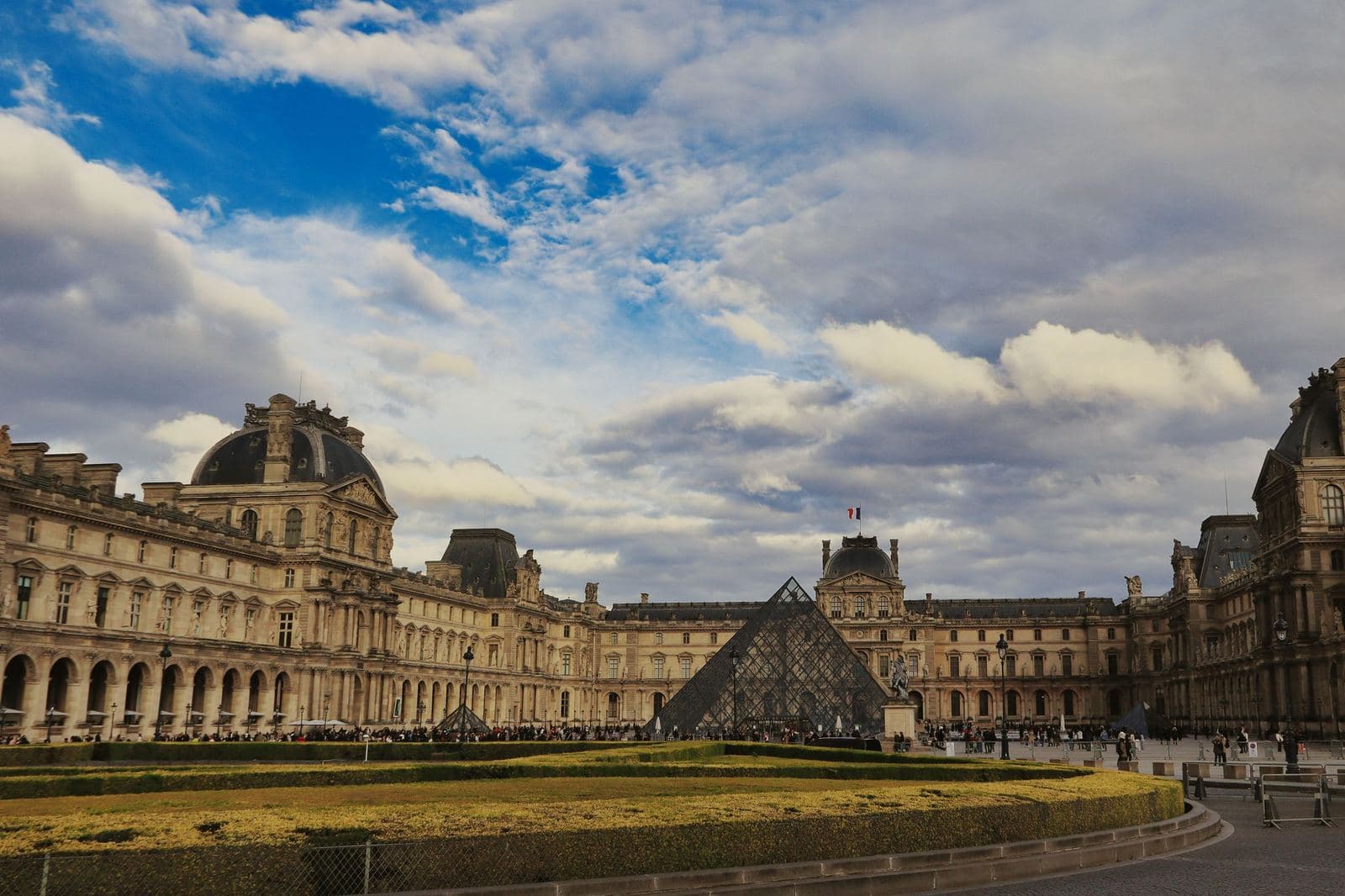 Louvre palace and the glass pyramid in the Cour Napoléon