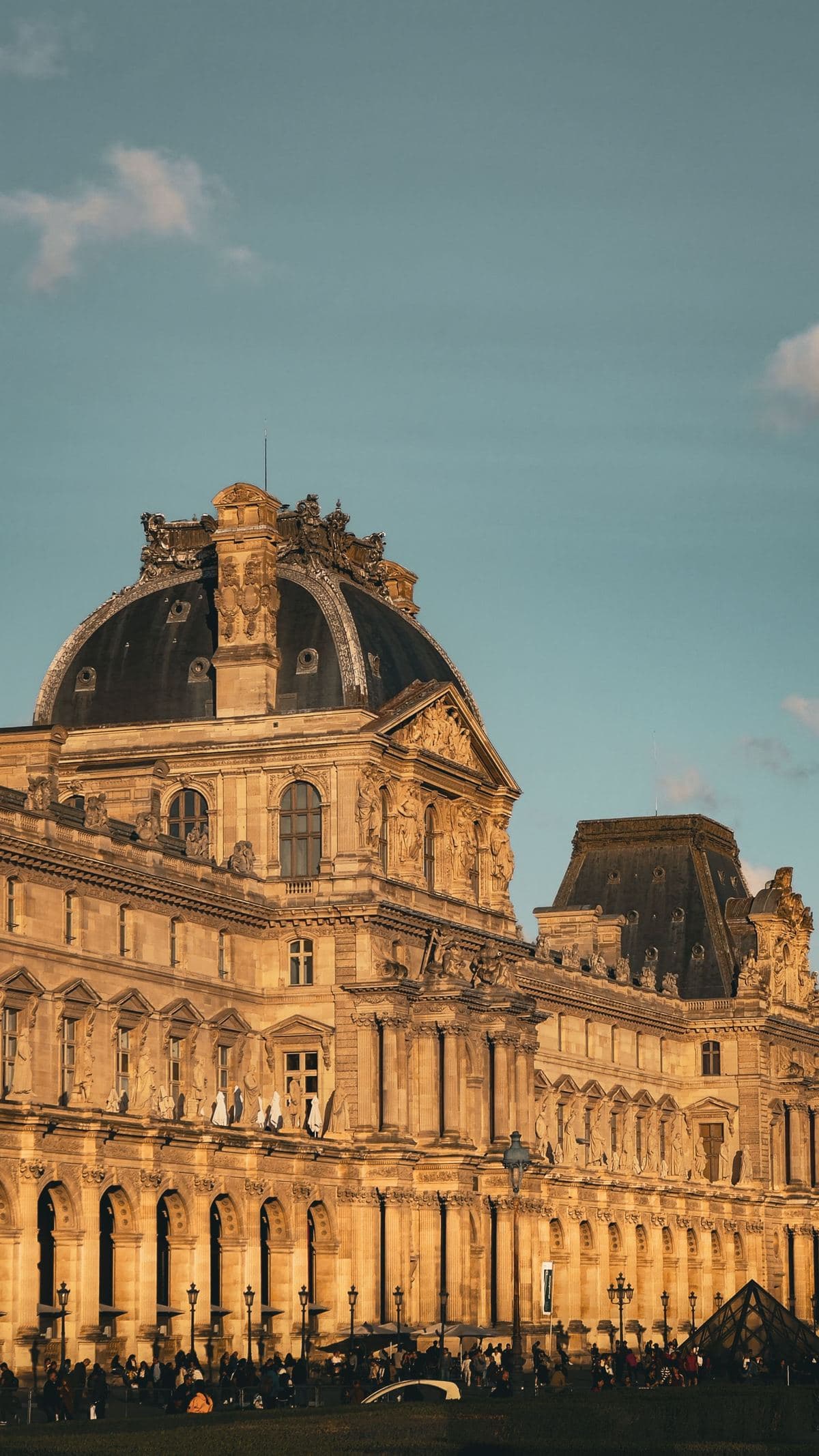 Louvre pavilion façade in warm evening light