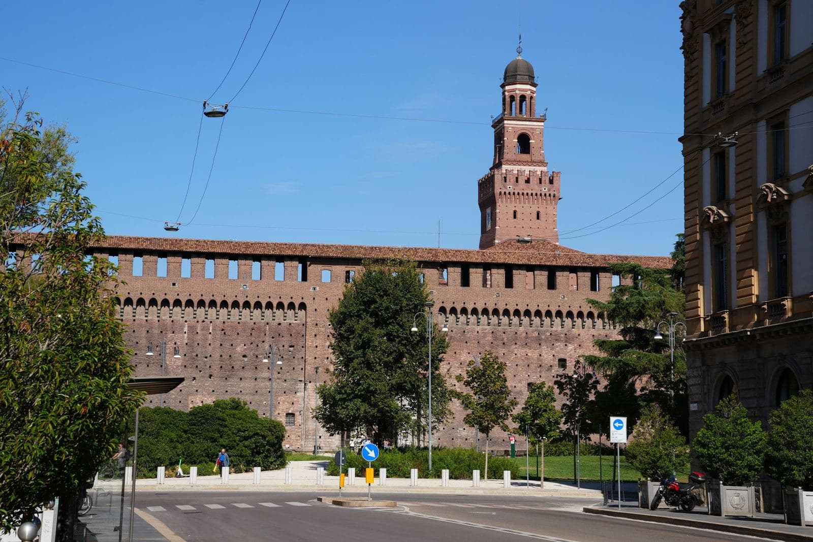 Sforza Castle on a sunny day, a stop on the open-bus route