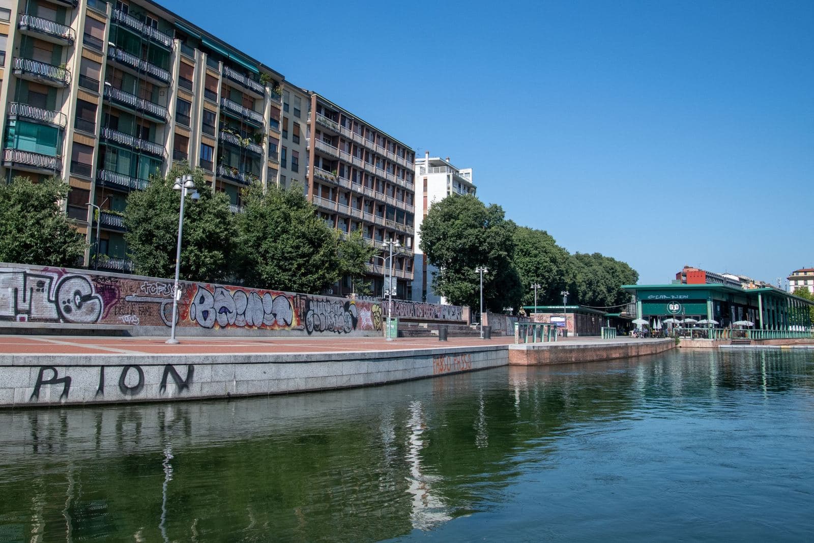 Navigli canal-side buildings reflected in the water, Milan