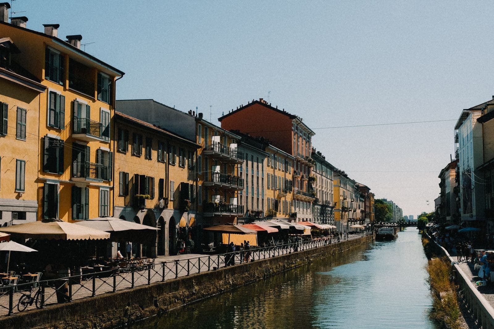 Canal street lined with coloured houses in the Navigli district