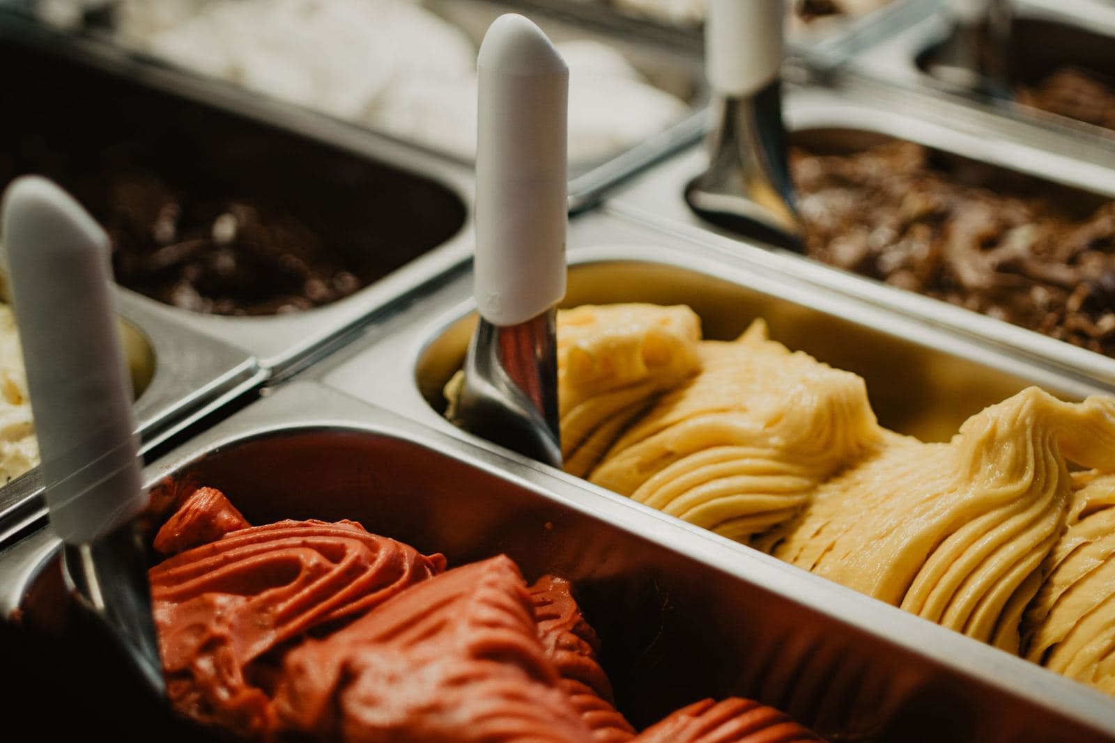 Trays of gelato in a shop counter
