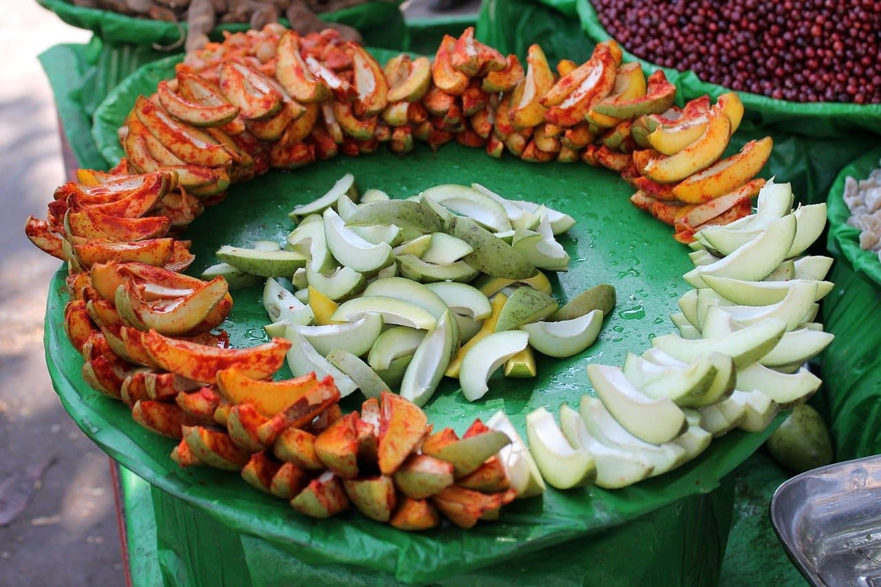 Fruit piled on a market stall in Pune
