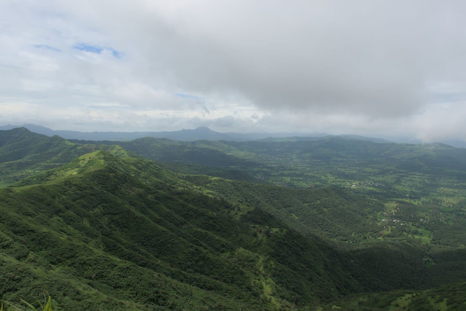 Green Sahyadri hills seen from Sinhagad Fort in the monsoon