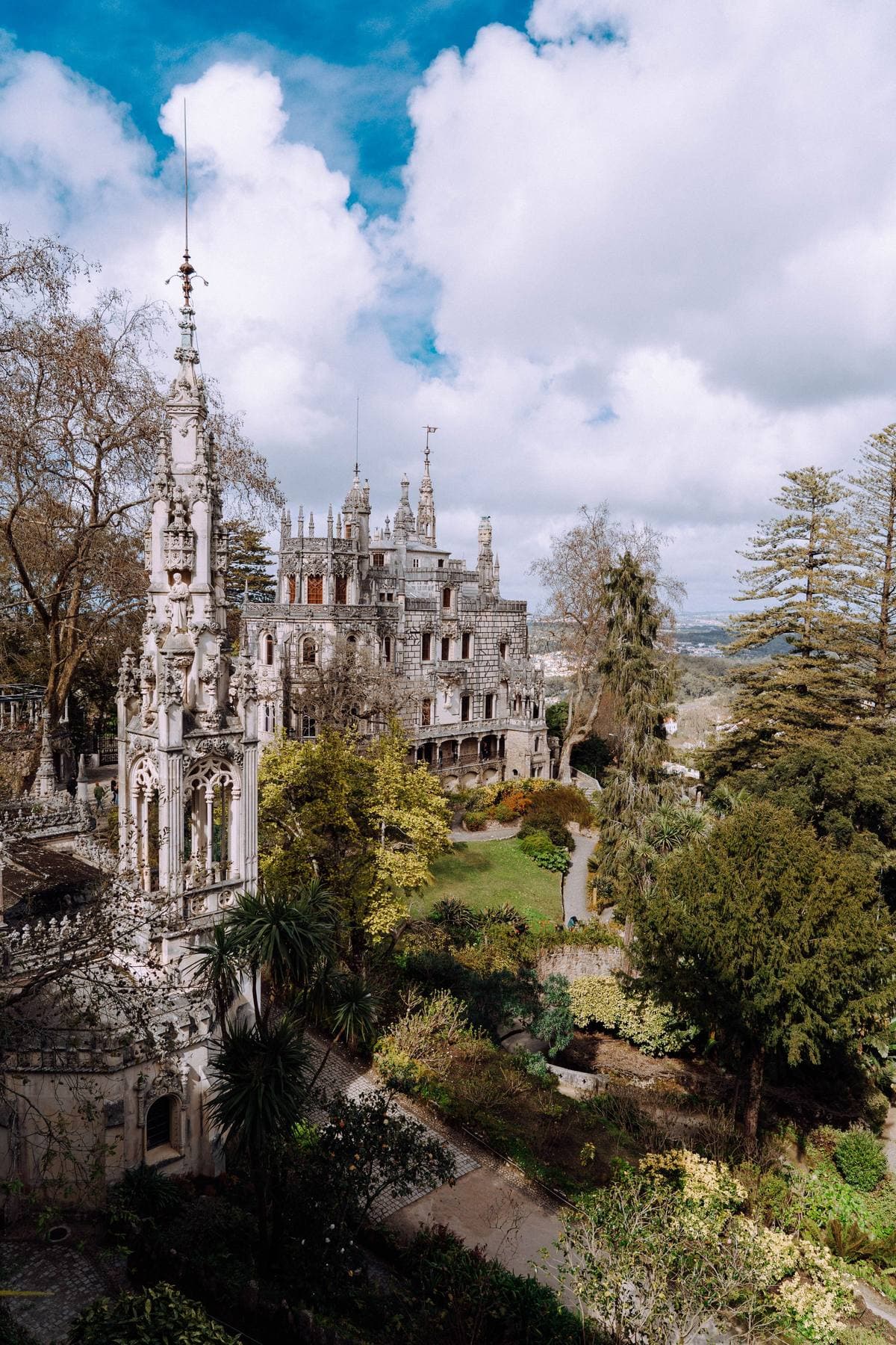 The palace of Quinta da Regaleira rising above its gardens