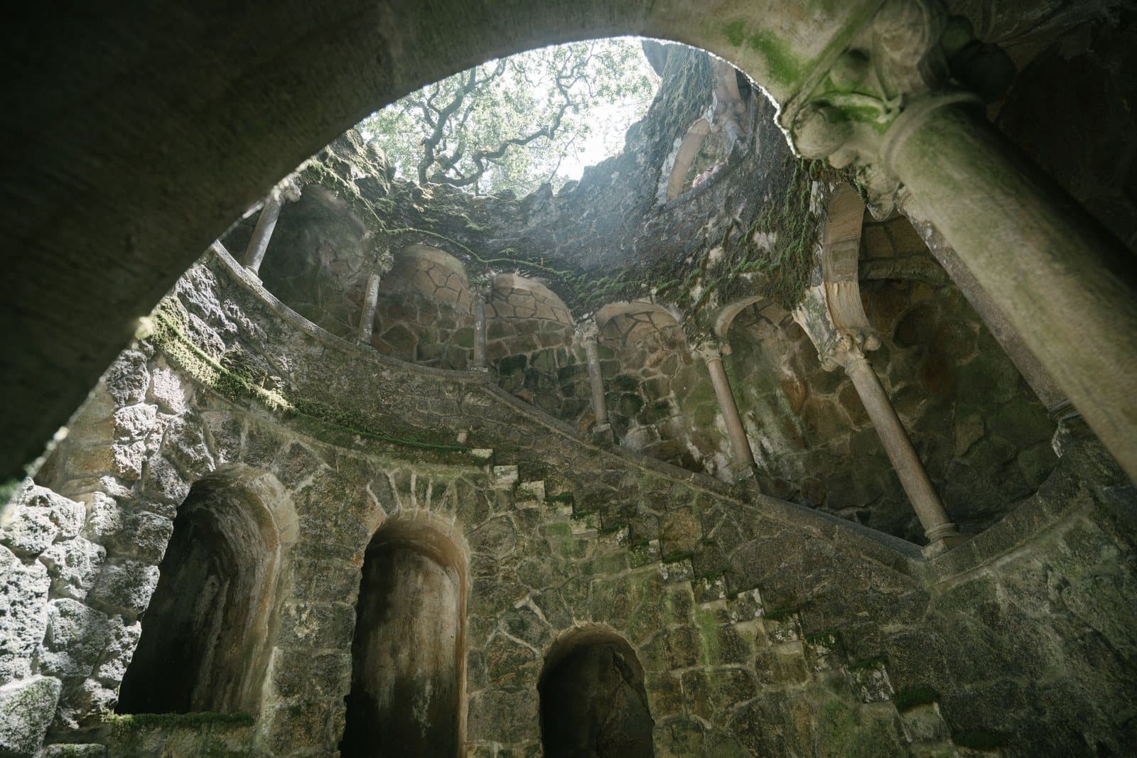 The stone arches of the Initiation Well at Quinta da Regaleira