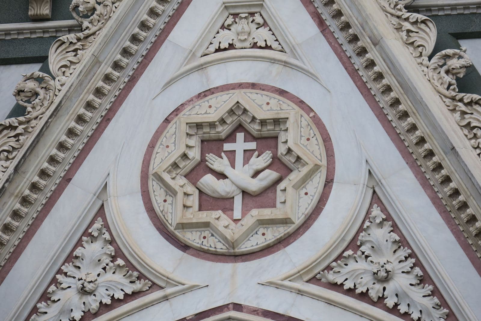 Carved emblem on the façade of Santa Croce