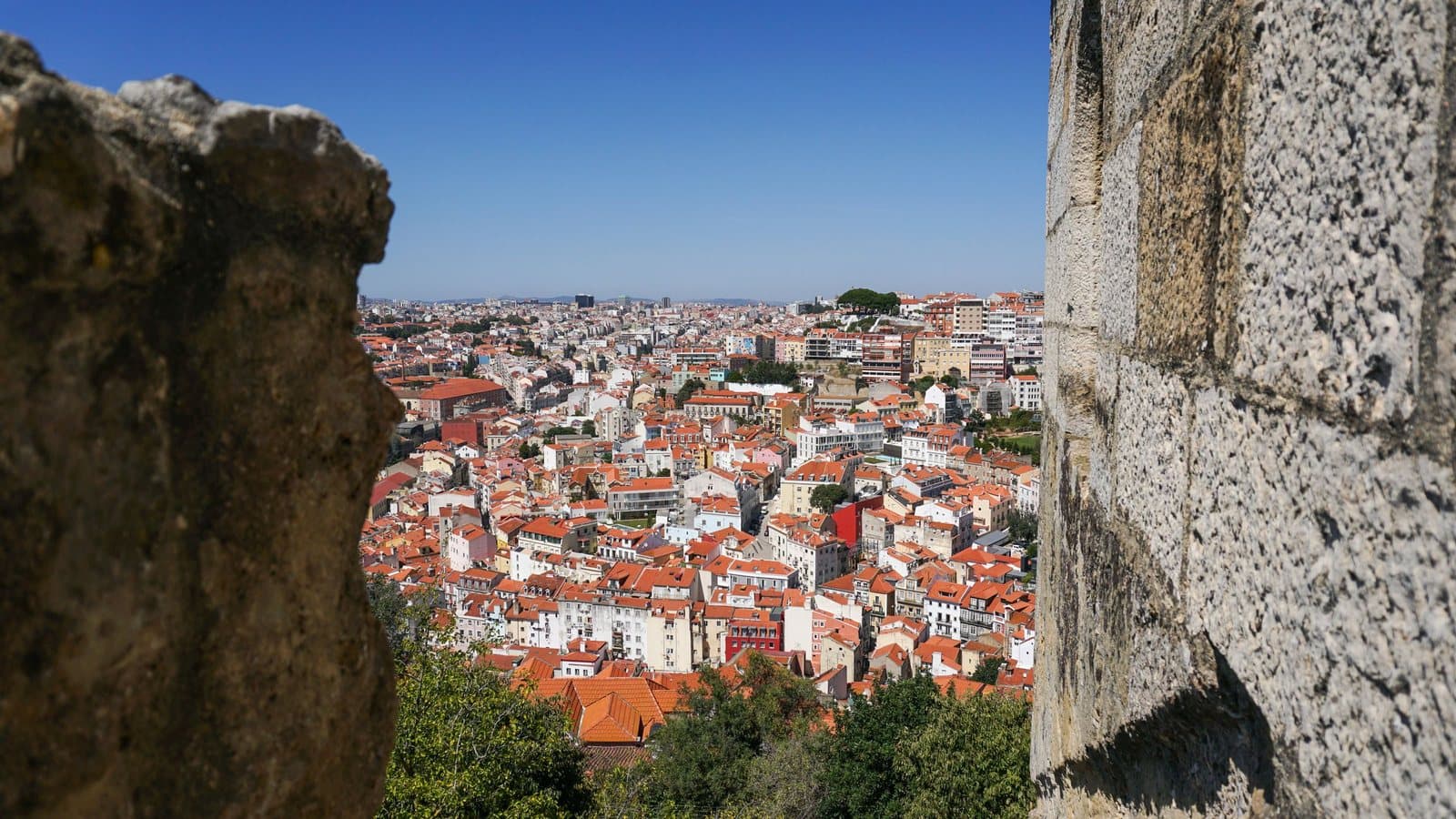 Lisbon's red rooftops seen from the castle walls