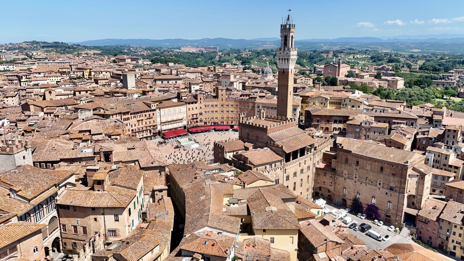 Siena's rooftops and the Torre del Mangia above Piazza del Campo