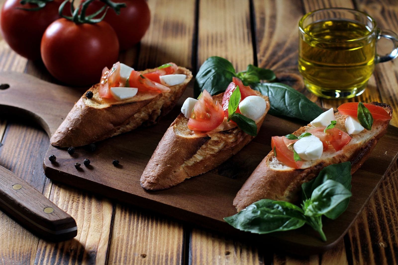Bruschetta with tomato, mozzarella and basil