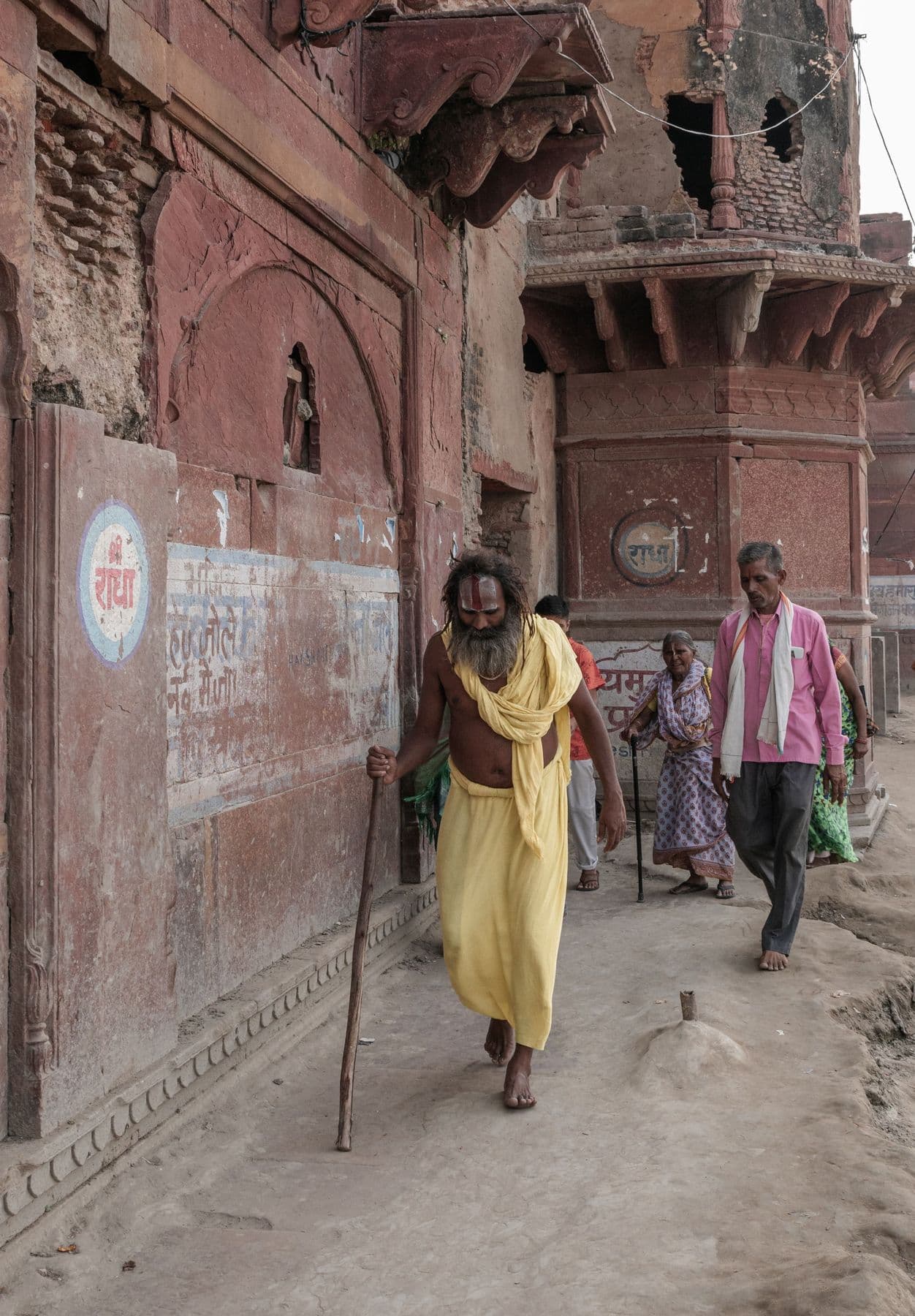 Pilgrims walking along a lane in Vrindavan
