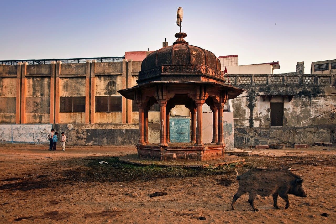 An old domed pavilion in an open square in Vrindavan