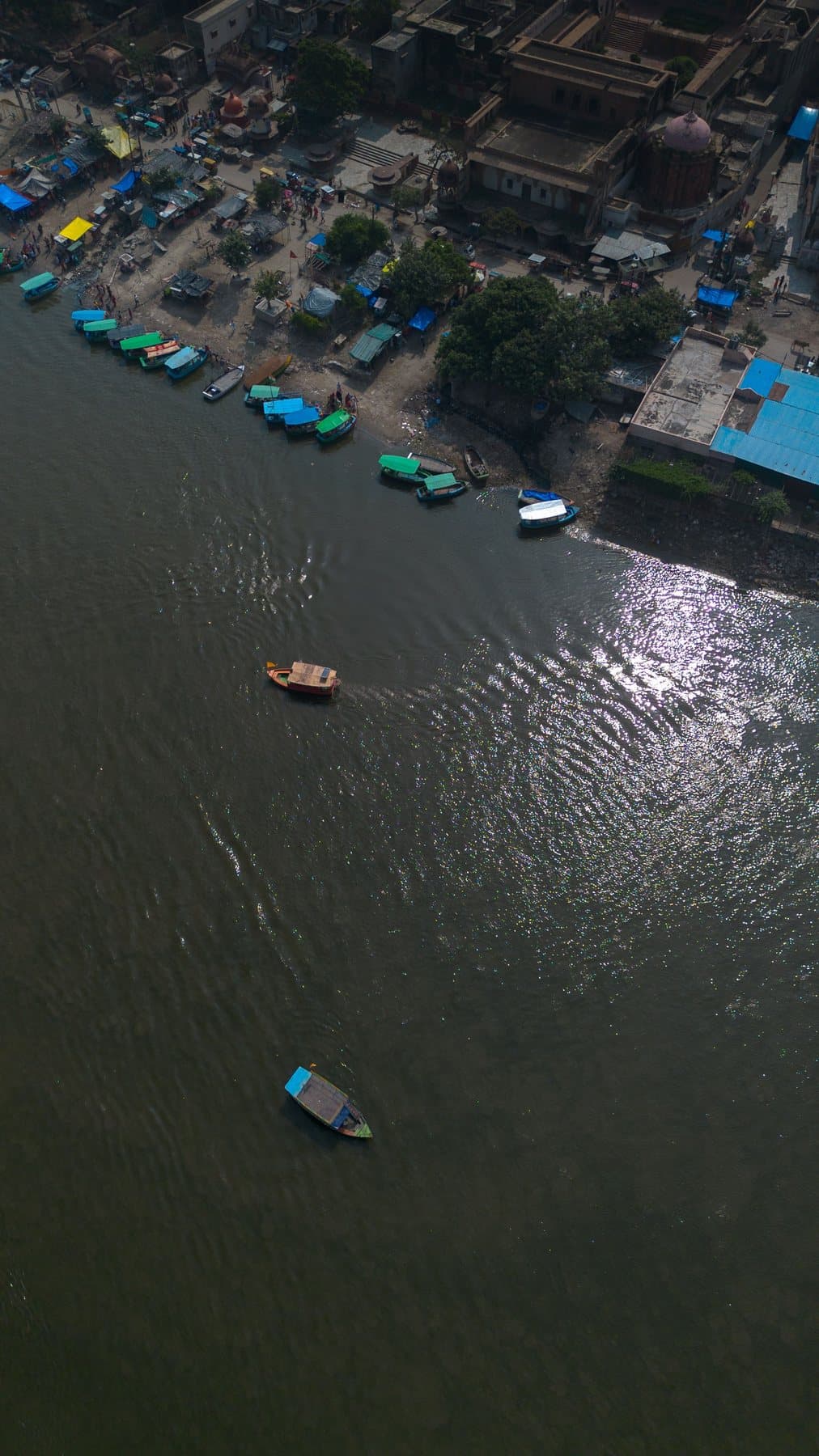 A boat on the Yamuna near Vrindavan's ghats, from above
