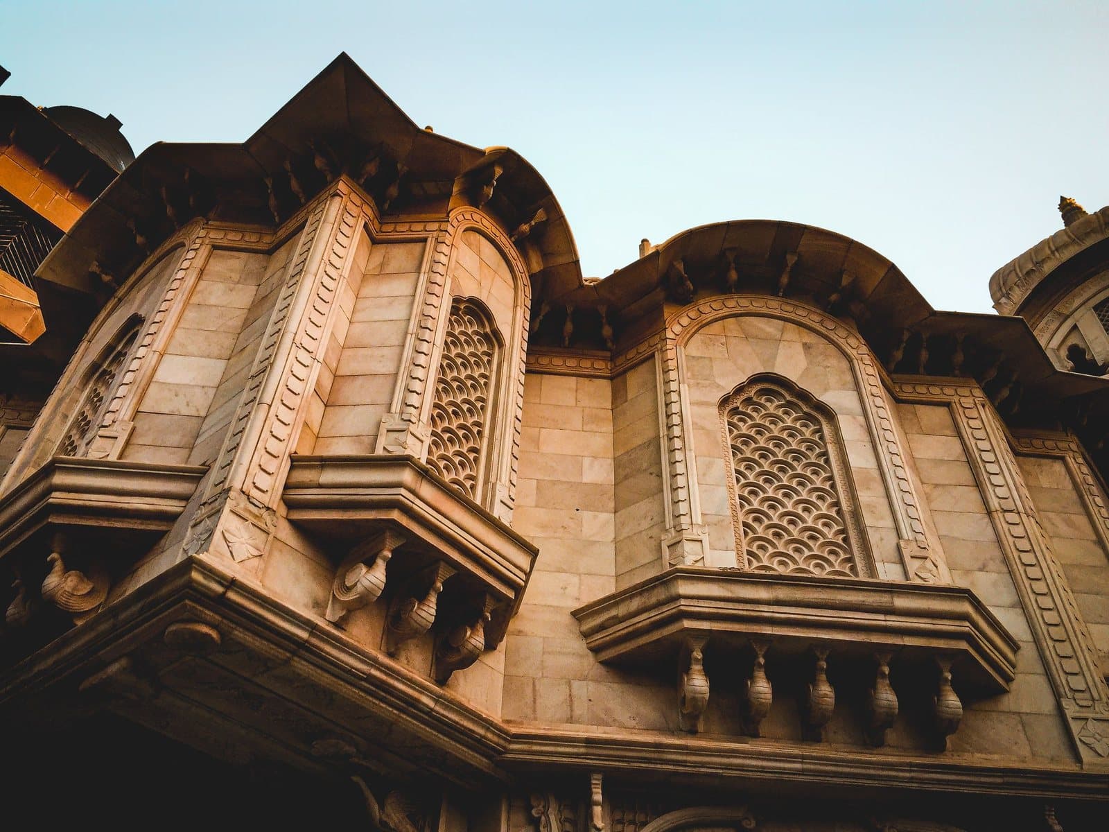 Carved balconies of the Sri Krishna Balaram Mandir, Vrindavan, from below