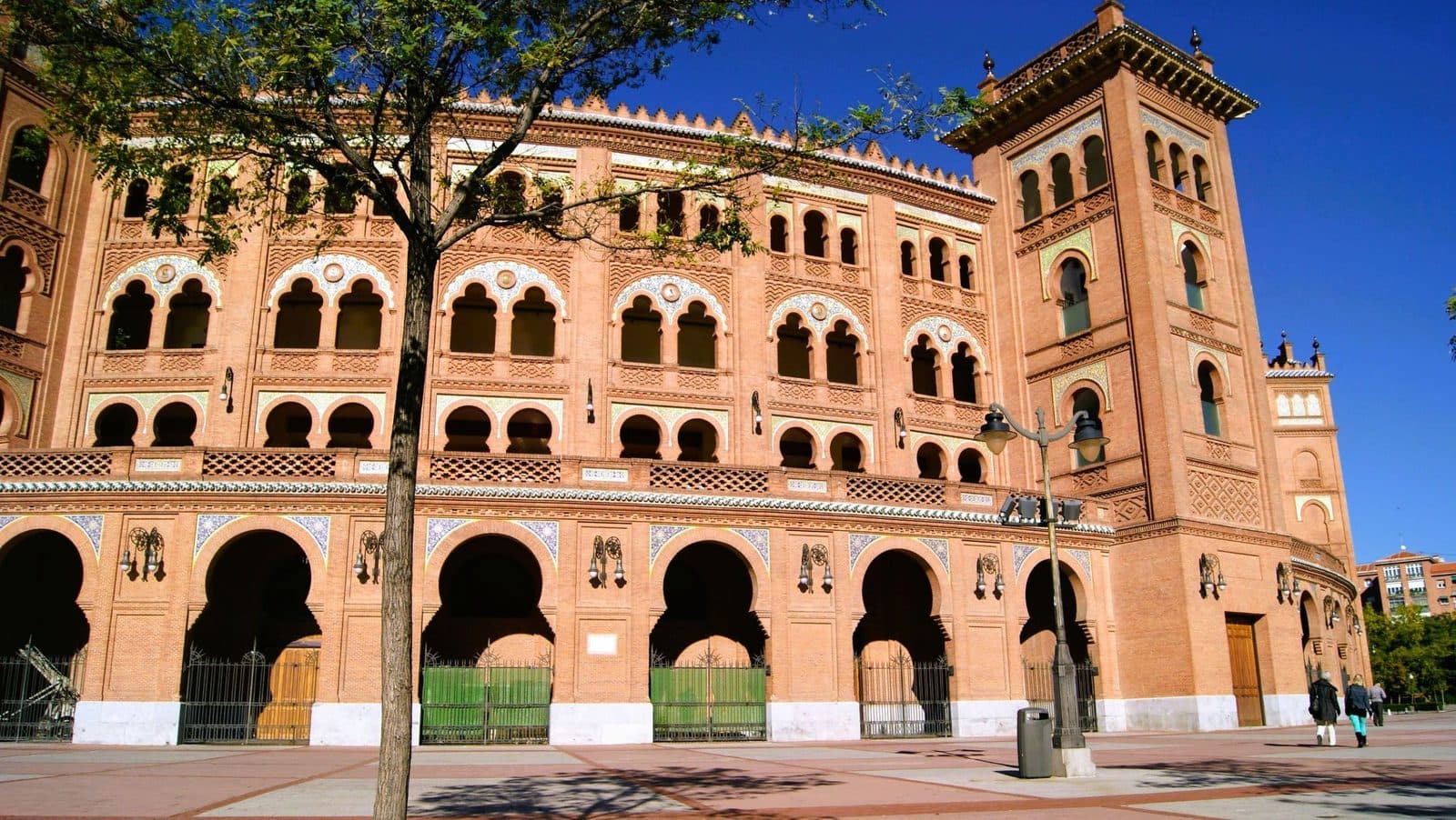 Neo-Mudéjar brick façade of Las Ventas bullring under a clear sky