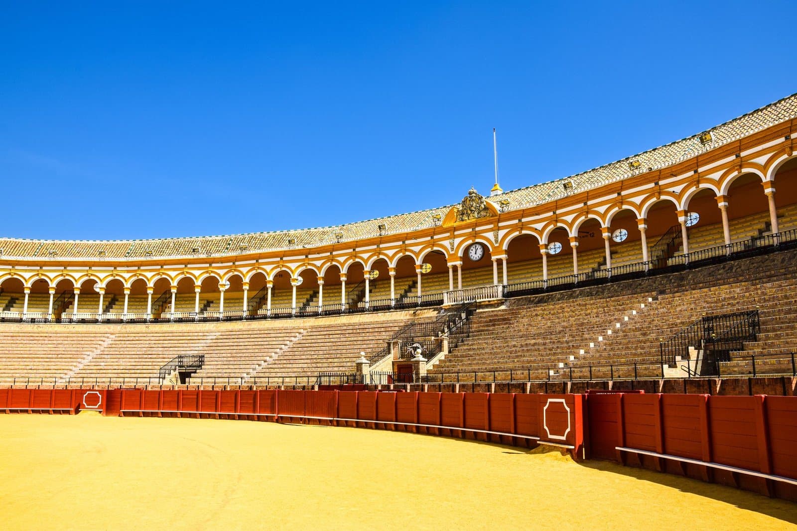 The ring and the white-and-ochre stands of the Real Maestranza bullring in Seville