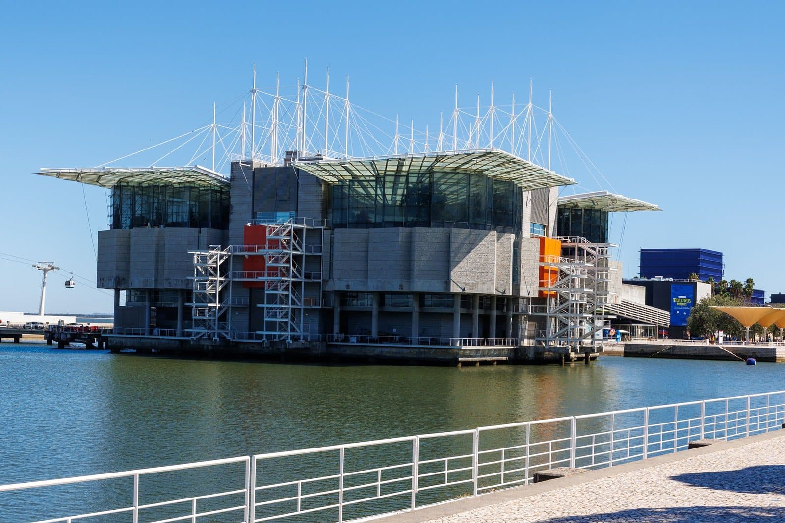 The Oceanário de Lisboa building on the water in Parque das Nações