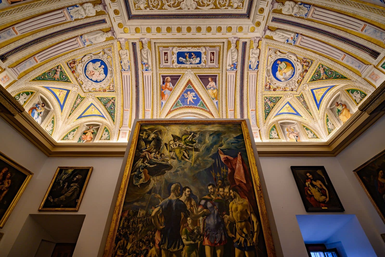 Painted ceiling and Old Master paintings in a Madrid art museum